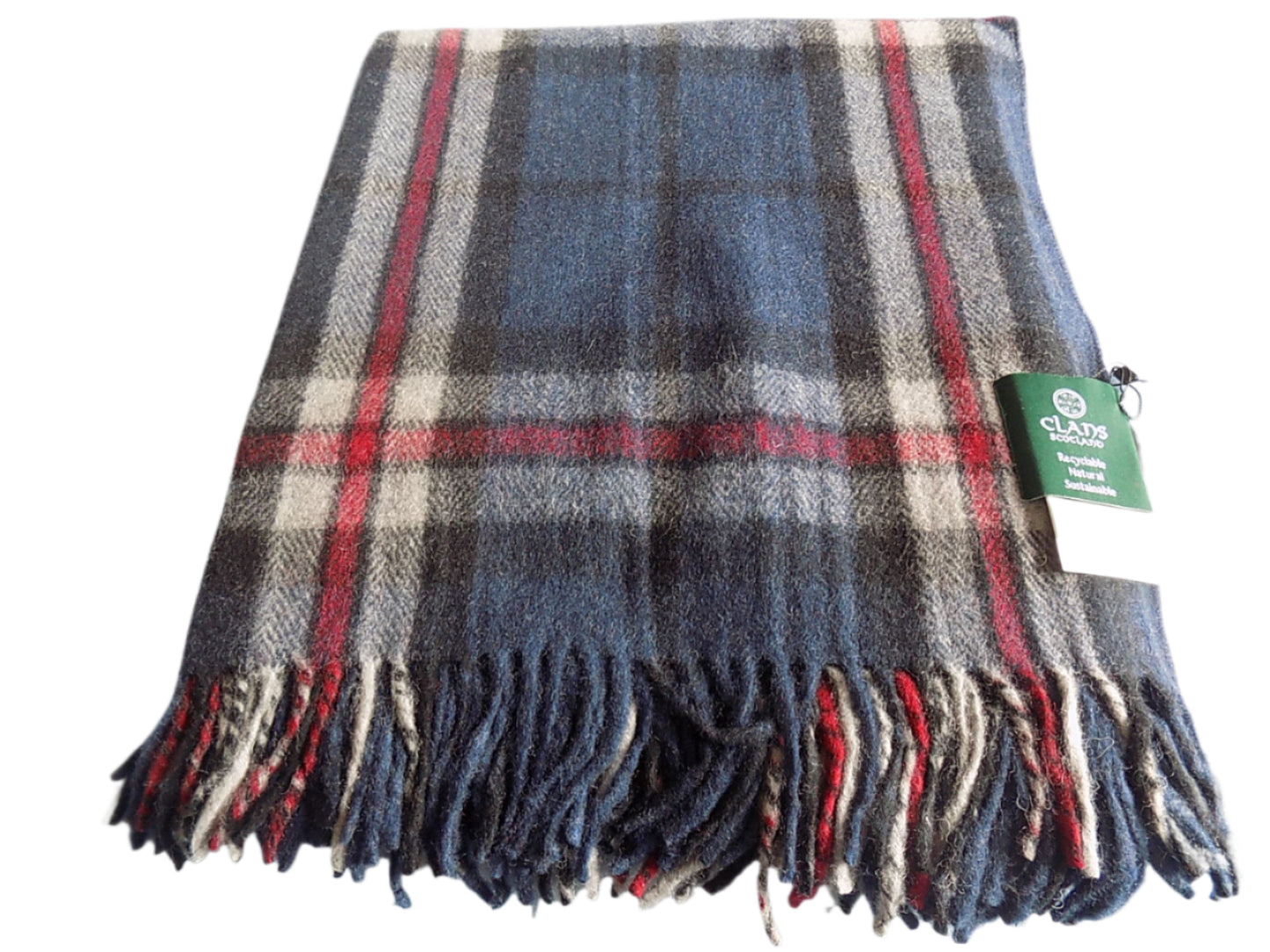 Highland wool blend tartan blanket throw in Thomson Navy Tartan, styled as cotton throw, inspired by Scotland traditional clothing and kilt for women.